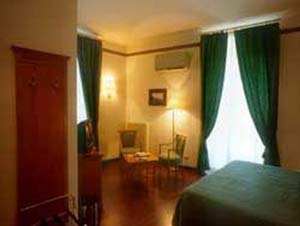 Standard single with garden view, balcony, private facilities (shower), and breakfast